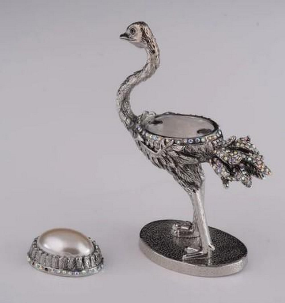 Silver Ostrich Elegance Trinket Box: Silver Ostrich Elegance Trinket Box Sleek and striking, this silver ostrich trinket box showcases the graceful form of the exotic bird with textured feathers and refined detailing. Finished in a