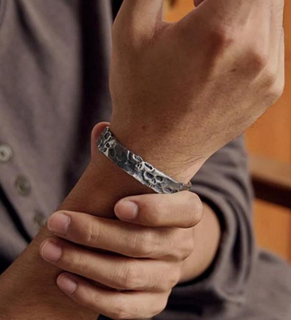 Ghost Face Bangle: Ghost Face Bangle Rooted in ancient Mongolian folklore, the Ghost Face Bangle features a hand-carved spectral visage symbolizing protection, wisdom, and the bridge between worlds. Each piece is