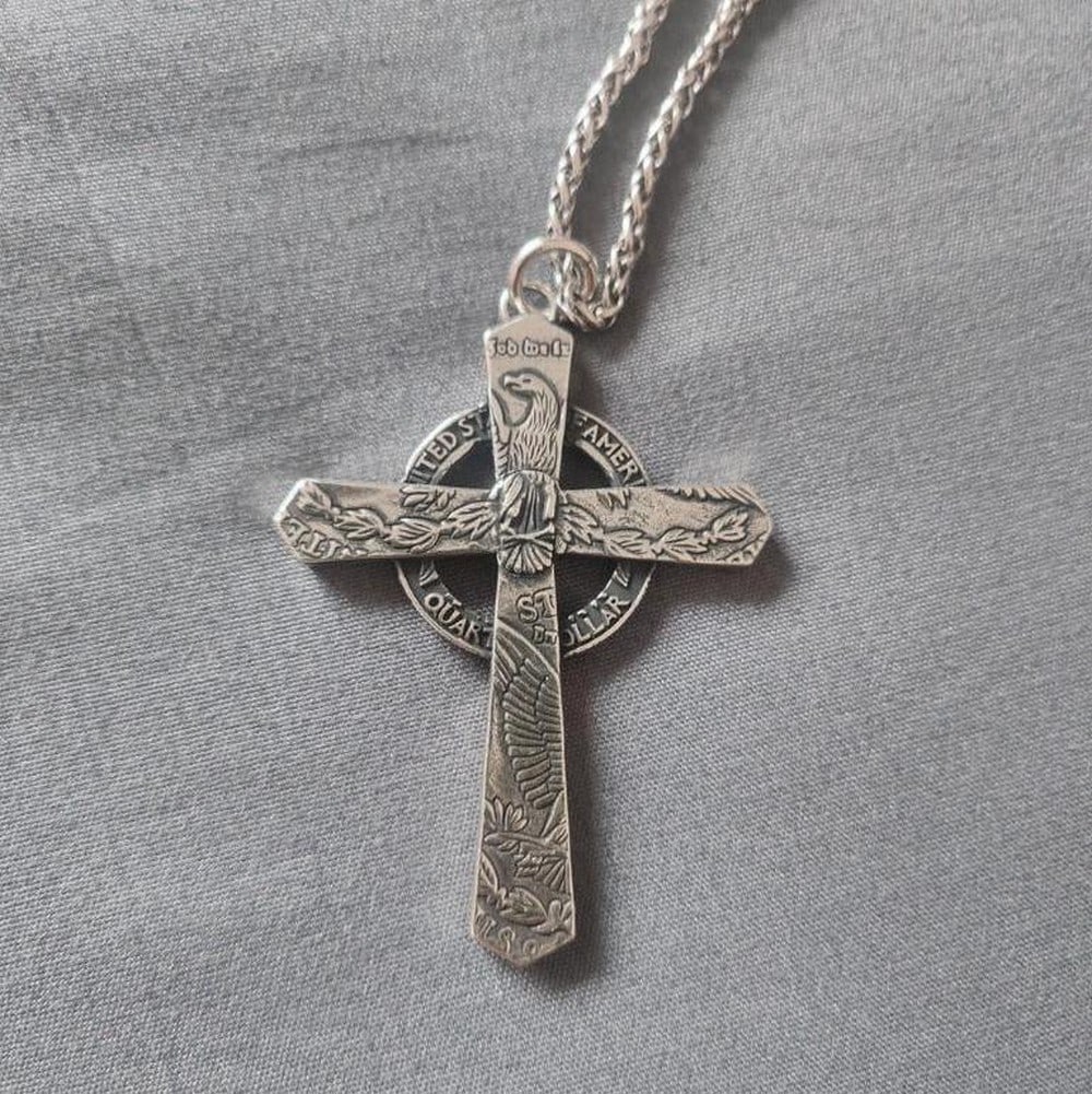 Morgan Silver Coin Cross Pendant: Morgan Silver Coin Cross Pendant Crafted from authentic 1921 Morgan Silver Dollars, the Morgan Silver Coin Cross Pendant showcases a bold blend of faith and heritage. Each double-sided cross is