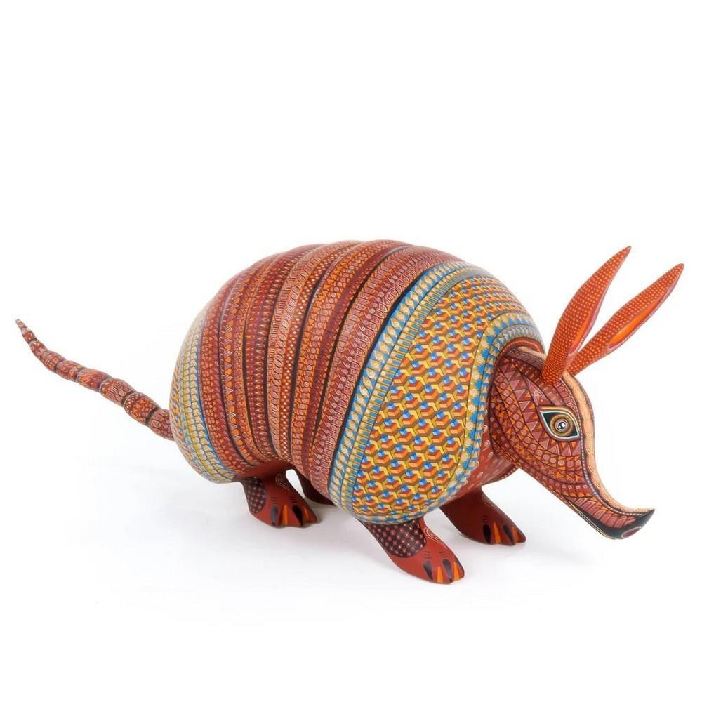 Zapotec Armadillo – Oaxacan Alebrije of Protection & Power: Zapotec Armadillo – Oaxacan Alebrije of Protection & Power Rooted in the spirit of the earth and carved with masterful intent, this one-of-a-kind armadillo alebrije radiates ancestral symbolism