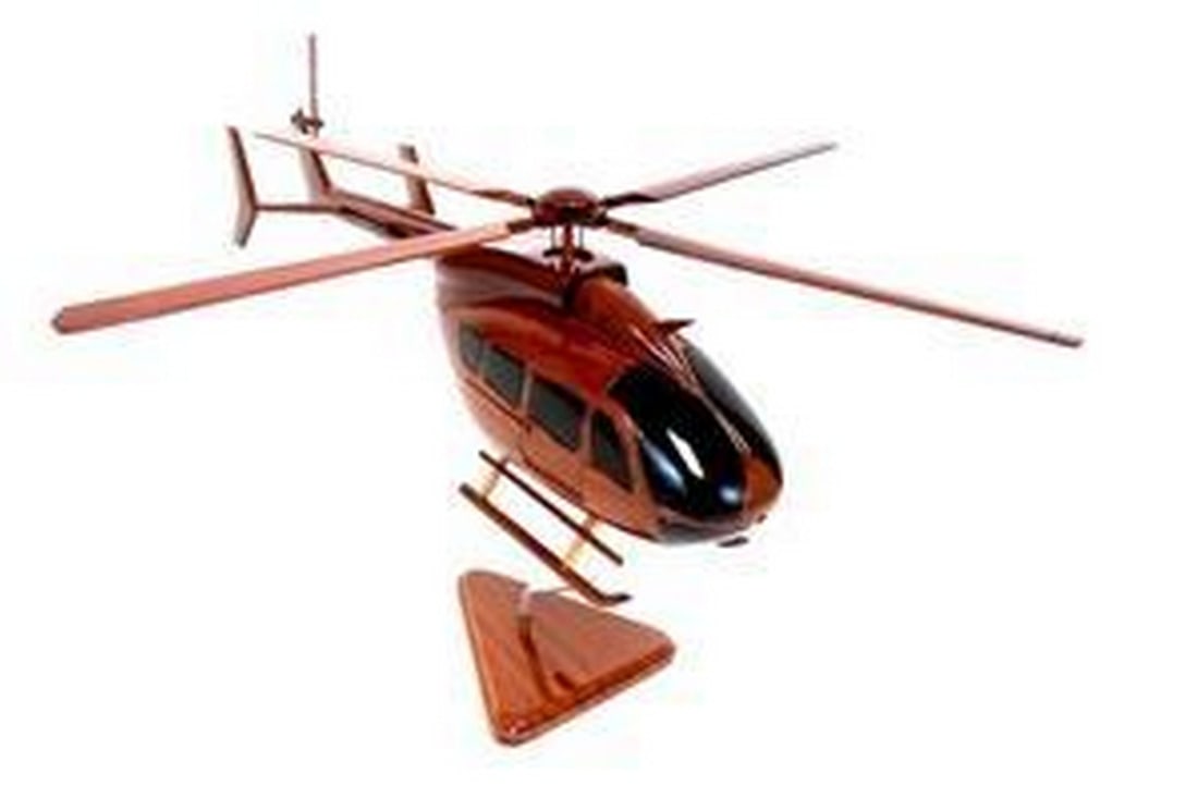 UH-72 Lakota Helicopter: UH-72 Lakota Helicopter The Uh-72 is beautifully recreated in this handcrafted scale model. Made of solid mahogany and finely detailed, this classic aircraft in a clear polyurethane high gloss