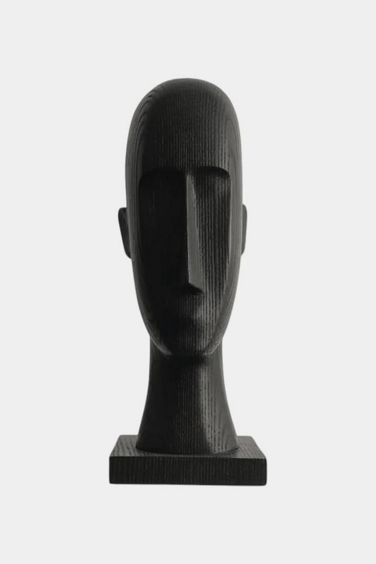 Still Form – Minimalist Wooden Head Sculpture: Still Form – Minimalist Wooden Head Sculpture A contemplative wooden sculpture that distills the human face into pure, elegant abstraction. With deep-set eyes, a prominent nose, and a smooth