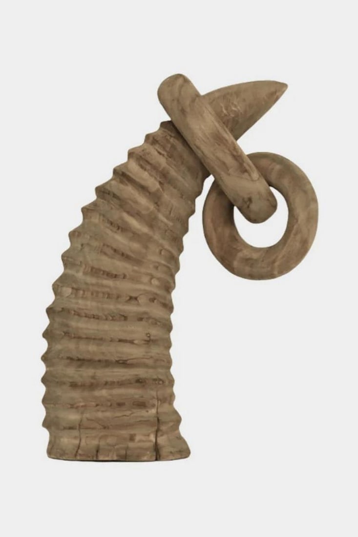 “Resonance Form?? Wooden Art Sculpture: “Resonance Form” Wooden Art Sculpture A sculptural interplay of curve and contrast, Resonance Form reveals a horned silhouette with concentric ridges that beckon touch and attention. Its loope