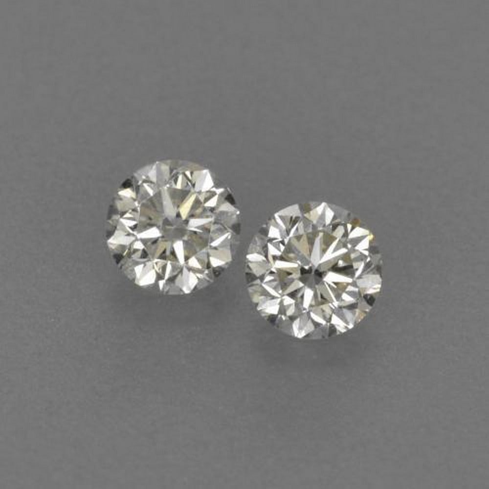 0.17ct Diamond-Cut Warm White Diamonds: 0.17ct Diamond-Cut Warm White Diamonds This contains a pair of diamond-cut Diamonds, each at 0.09ct Raw Dimension: 2.8 x 2.8mm Total Carat Weight: 0.17ct Treated: No Please view photos