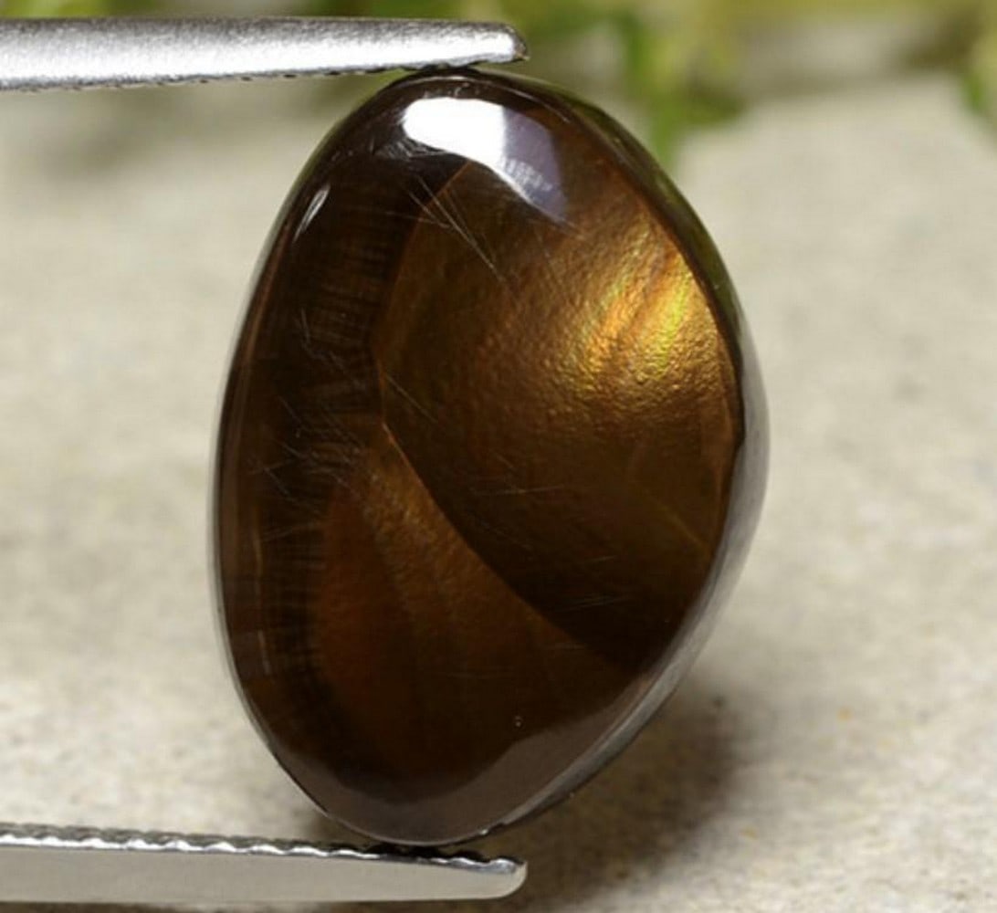7.08ct Chocolate Fire Agate from Mexico: 7.08ct Chocolate Fire Agate from Mexico. Fire agate, a variety of chalcedony, is a semi-precious natural gemstone discovered so far only in certain areas of central and northern Mexico and the southw