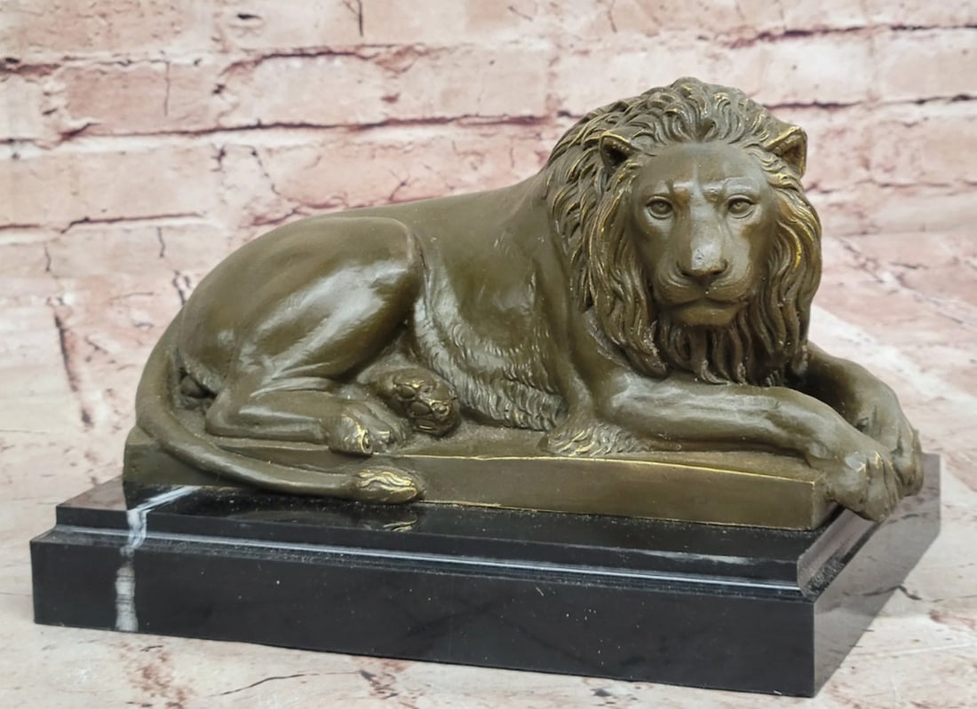 Resting King of the Jungle Inspired Bronze Statue - 7" x 10": Resting King of the Jungle Inspired Bronze Statue - 7" x 10" This striking bronze sculpture by Barye embodies the majesty of the African male lion at rest, exuding quiet strength and natural