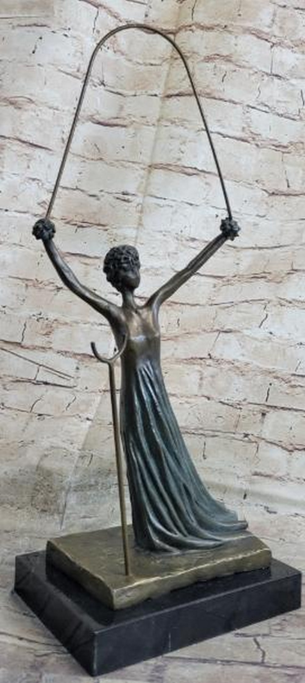 Alice in Wonderland: Reproduction Bronze Sculpture: Alice in Wonderland: Reproduction Bronze Sculpture Step into the fantastical realm of surrealism with this reproduction bronze sculpture, inspired by Salvador Dalí's iconic interpretation of