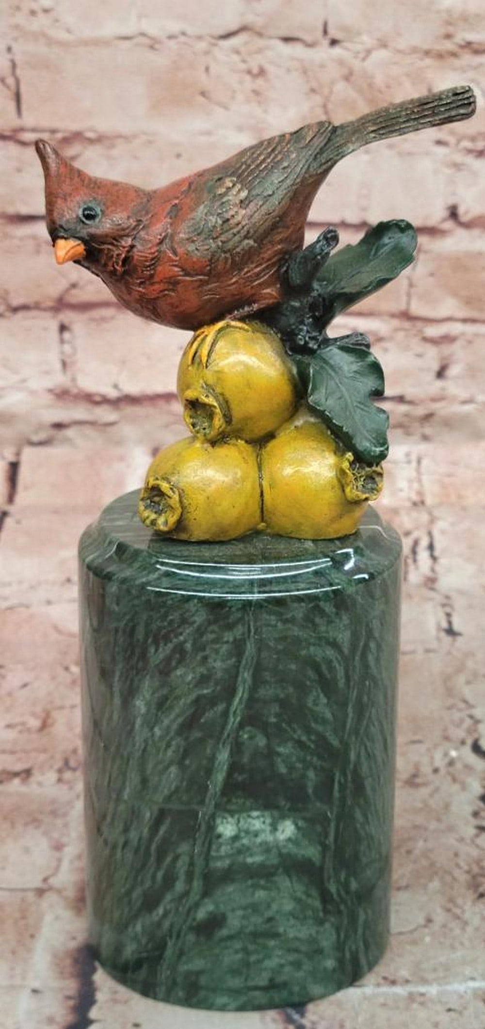 Milo Original Bronze Cardinal Sitting on Pomegranate Sculpture – 9" x 4": Milo Original Bronze Cardinal Sitting on Pomegranate Sculpture – 9" x 4" This original bronze sculpture depicts a cardinal perched atop a pomegranate, rendered with fine feather detailing a