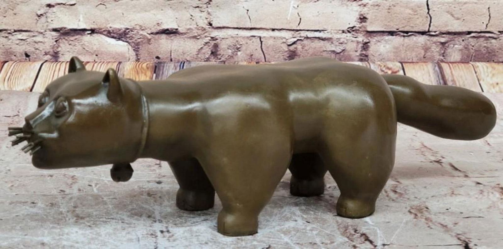 Fernando Botero El Gato De Botero Cat Gato Bronze Art Sculpture on Marble Base - 4" x 15": Fernando Botero El Gato De Botero Cat Gato Bronze Art Sculpture on Marble Base - 4" x 15" Experience the captivating charm of "Fernando Botero's El Gato De Botero Cat Gato Bronze Art