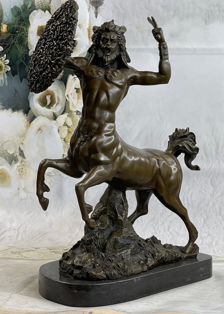 Stunning Bronze Centaur On Large Solid Marble Base: Stunning Centaur Bronze Sculpture The powerful centaur comes barreling out of the realm of Greek mythology wielding a sword and shield of snakes in hand. His powerful hooves beat down on the ground a