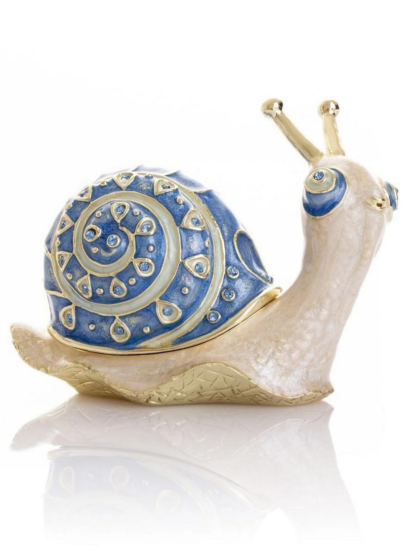 Jeweled Gold & Blue Snail Enamel Trinket Box: Jeweled Gold & Blue Snail Enamel Trinket Box Add a whimsical touch to your collection with this exquisite Gold & Blue Snail Trinket Box. The snail’s spiral shell is hand-painted in rich blu