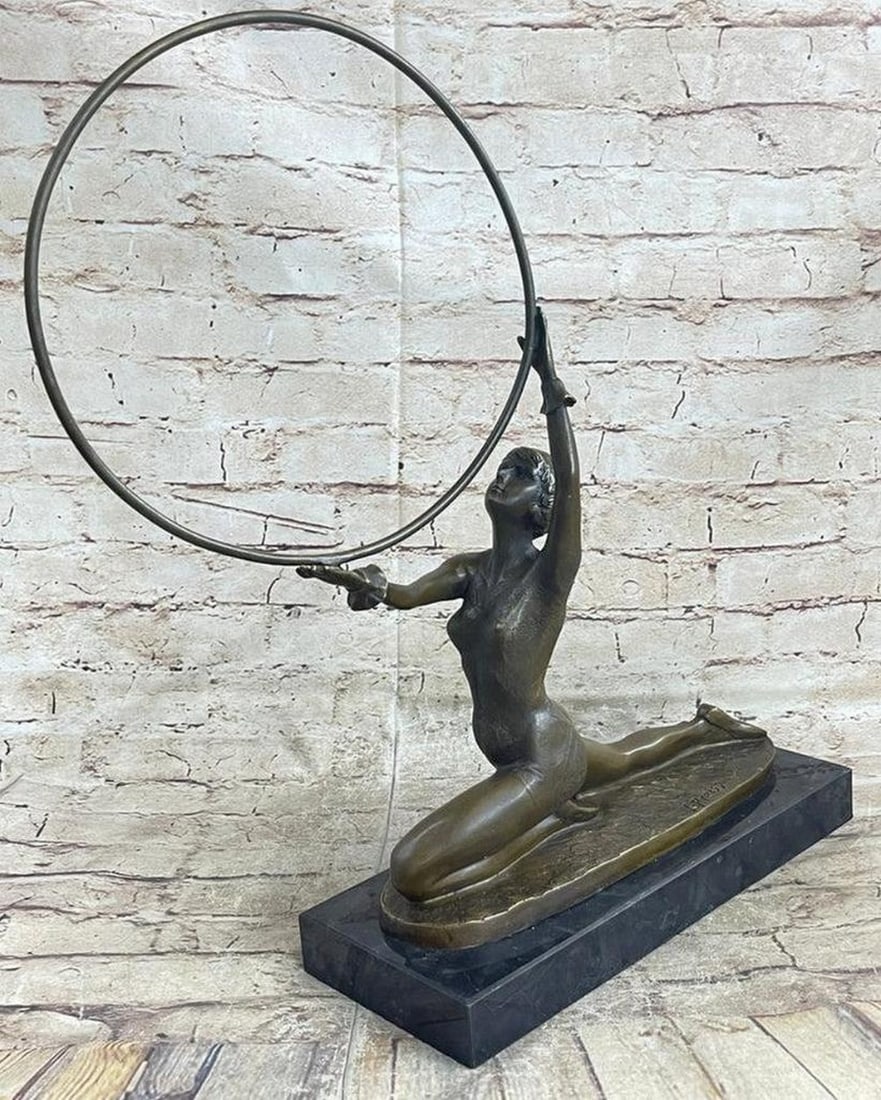 Sprawling Hoop Dancer Bronze Statue - 16.5" x 12": Sprawling Hoop Dancer Bronze Statue - 16.5" x 12" This meticulously crafted sculpture epitomizes the essence of the Art Nouveau movement with precision and grace. The artist&