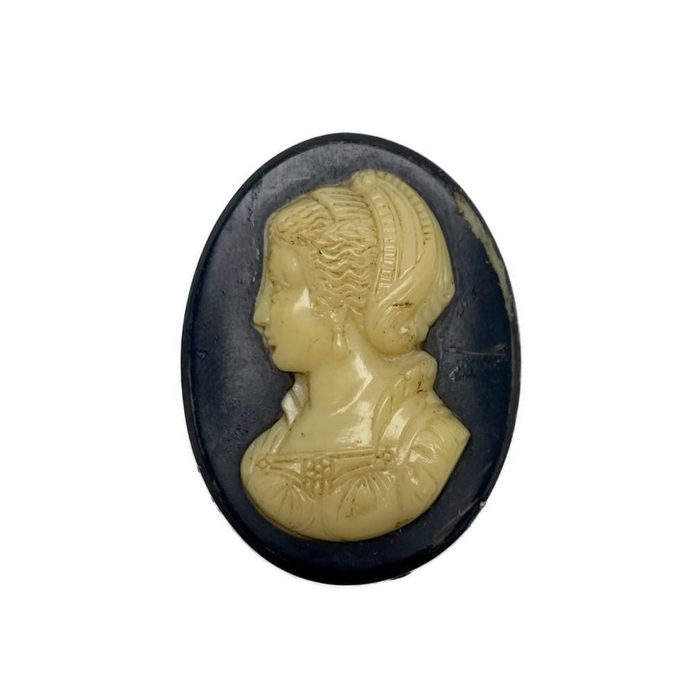 Classic Ladies Vintage Cameo Brooch panel: Classic Ladies Vintage Cameo Brooch panel This beautiful brooch panel is cream and black displaying classic elegance. This piece is very versatile as you can turn it into any kind of jewelry piece