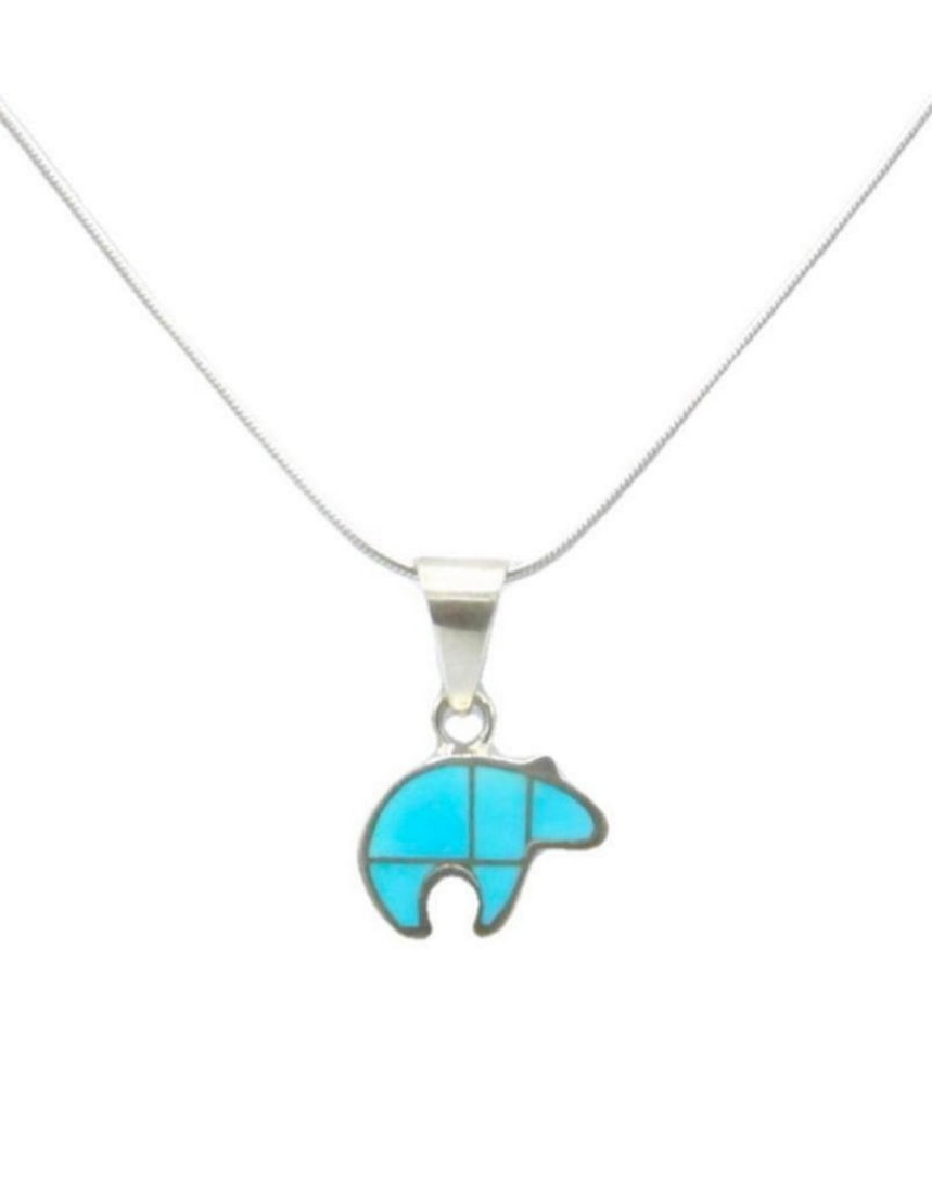 Little Blue Bear Necklace Pendant: Little Blue Bear Necklace Pendant This necklace pendant is sterling silver, and handmade with a turquoise stone. View Photos For Further Details