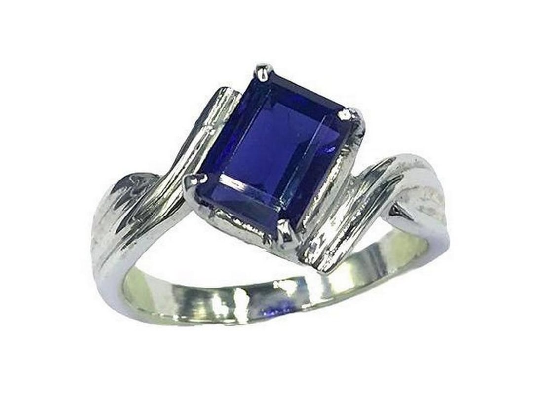 Sterling Silver Ring Set with Iolite Gemstone: Sterling Silver Ring Set with Iolite Gemstone Ring Size: 7 View Photos For Further Details.