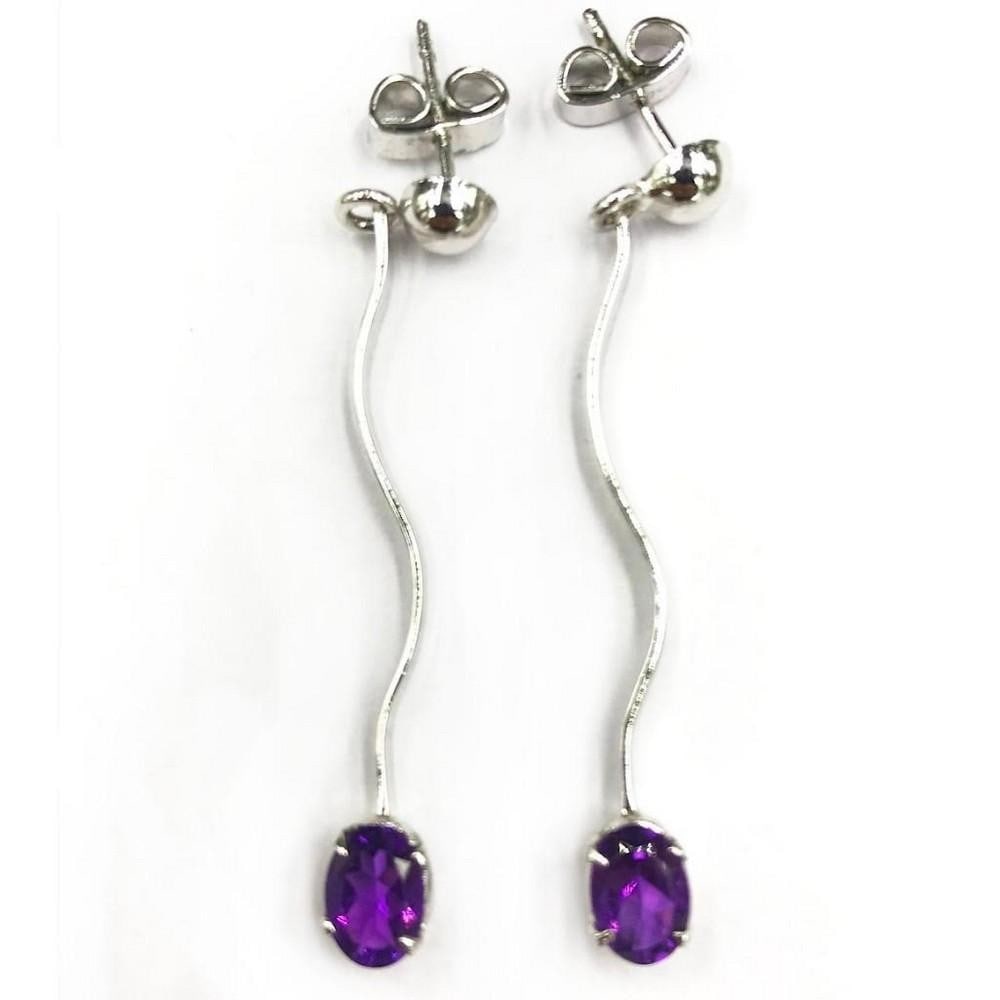 Sterling Silver Dangling Earrings Set with Amethyst Gemstones: Sterling Silver Dangling Earrings Set with Amethyst Gemstones View Photos For Further Details.