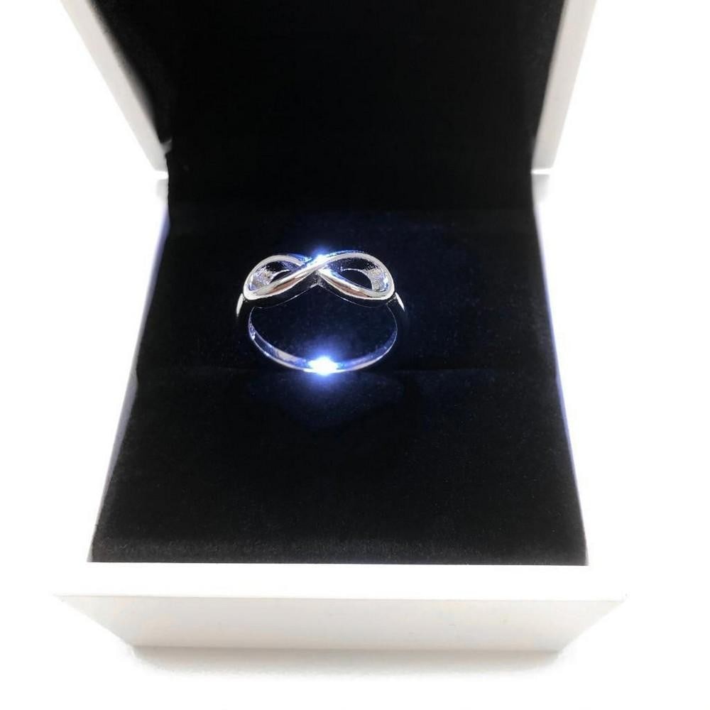 Ladies 925 Sterling Silver Infinity Ring: Ladies 925 Sterling Silver Infinity Ring. View Photos For Further Details.