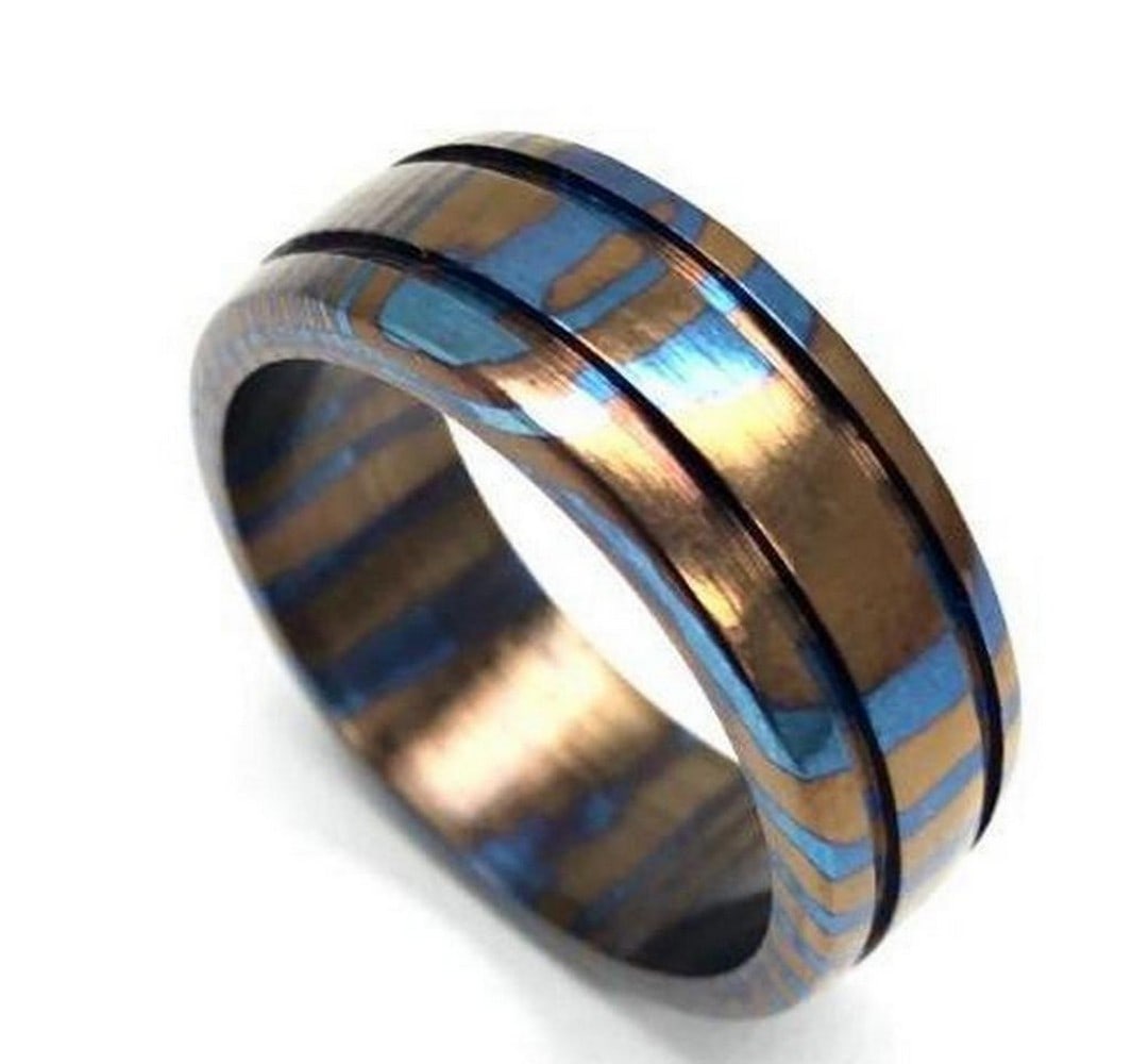 Men's Grooved Dammascus Titanium Ring: Men's Grooved Damascus Titanium Ring. View Photos For More Details.
