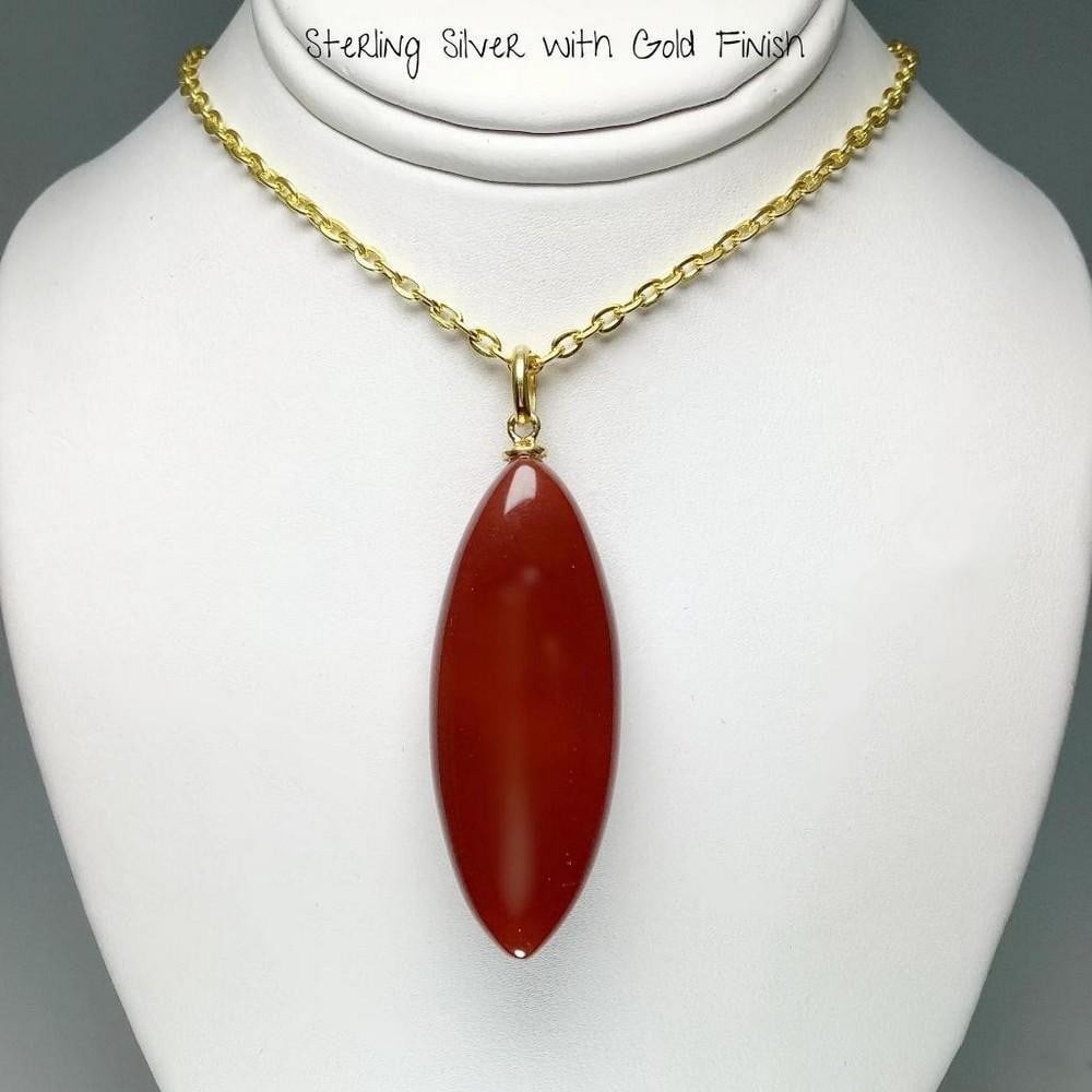 Sunfire Serenity Sterling Silver & Gold-Plated Carnelian Agate Pendant: Sunfire Serenity Sterling Silver & Gold-Plated Carnelian Agate Pendant Elevate your style with the Sunfire Serenity Sterling Silver & Gold-Plated Carnelian Agate Pendant, a radiant piece that