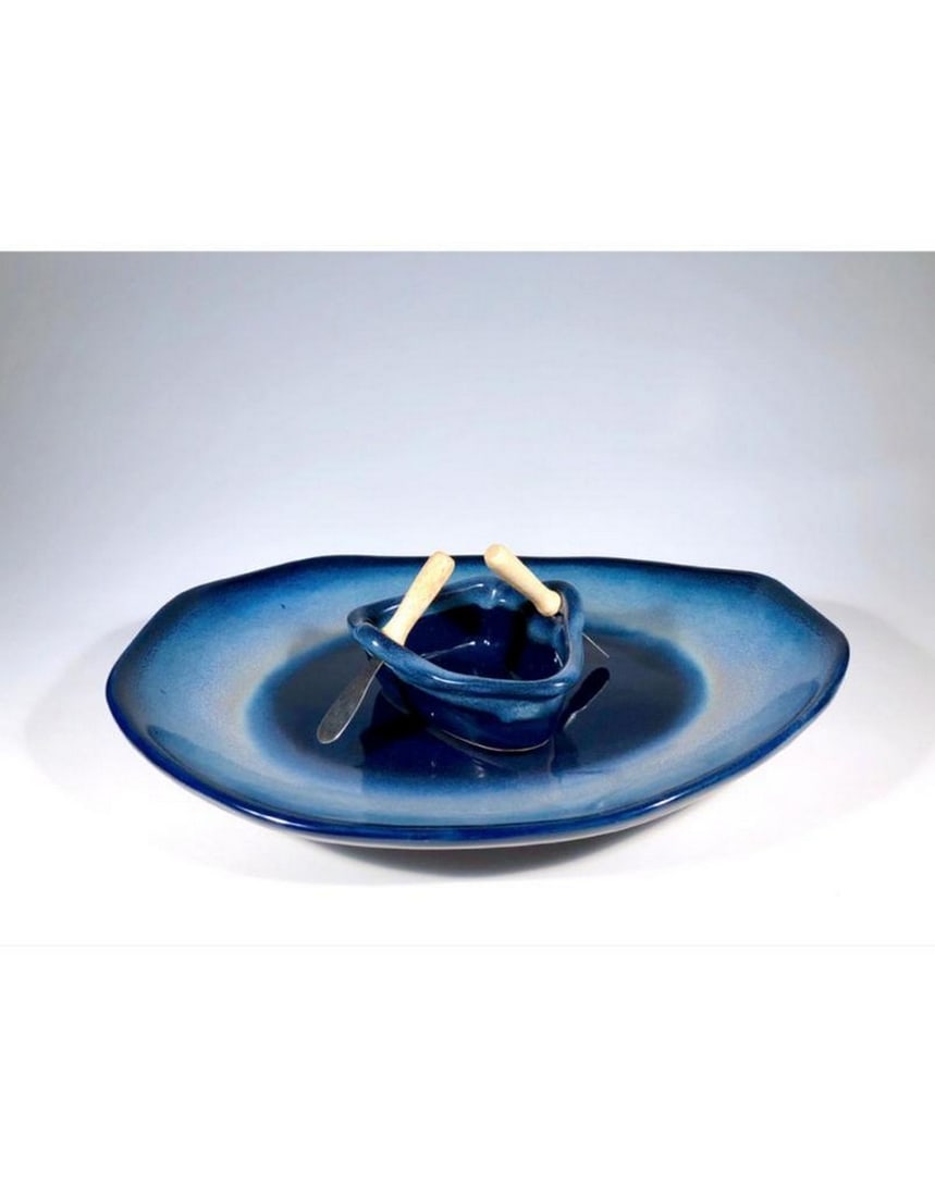 Northern Lights Boat on a Pond Dip Set: Northern Lights Boat on a Pond Dip Set Handcrafted by a Canadian artist, this piece is perfect for serving dips and chips, veggies and breads, or salsa and nachos. It includes two oars (spreaders)