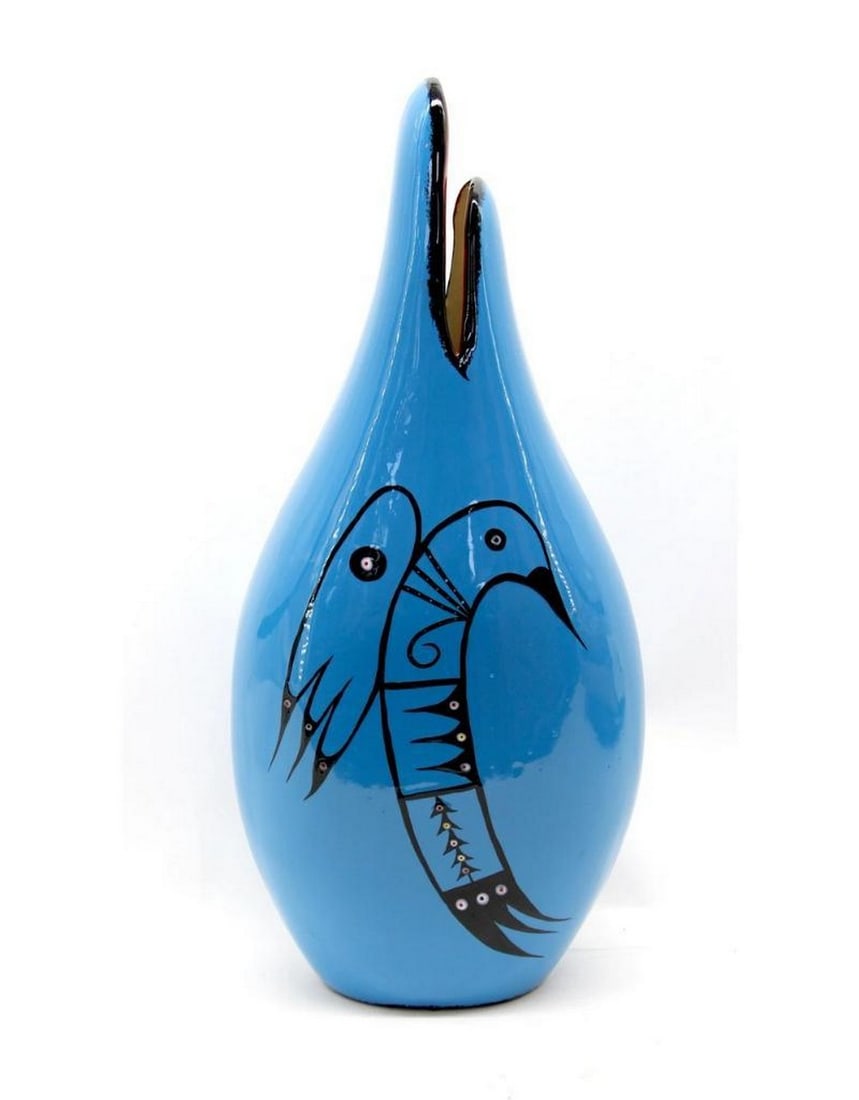 Hummingbird Blue Baja Vase by Veran Pardeahtan: Hummingbird Blue Baja Vase by Veran Pardeahtan Veran's Ceremonial Black Rim Pottery designs are unique expressions of the rich heritage of North American Indigenous culture. The symbols, often