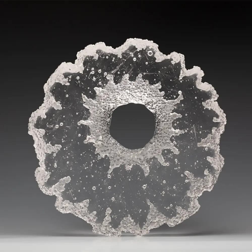 Snow Wheel' Clear Glass Sculpture by Julie Light: 'Snow Wheel' Clear Glass Sculpture by Julie Light Julie Light's Snow Wheel 2 clear glass sculptures are striking modern artworks that explore the interplay between natural and manmade te