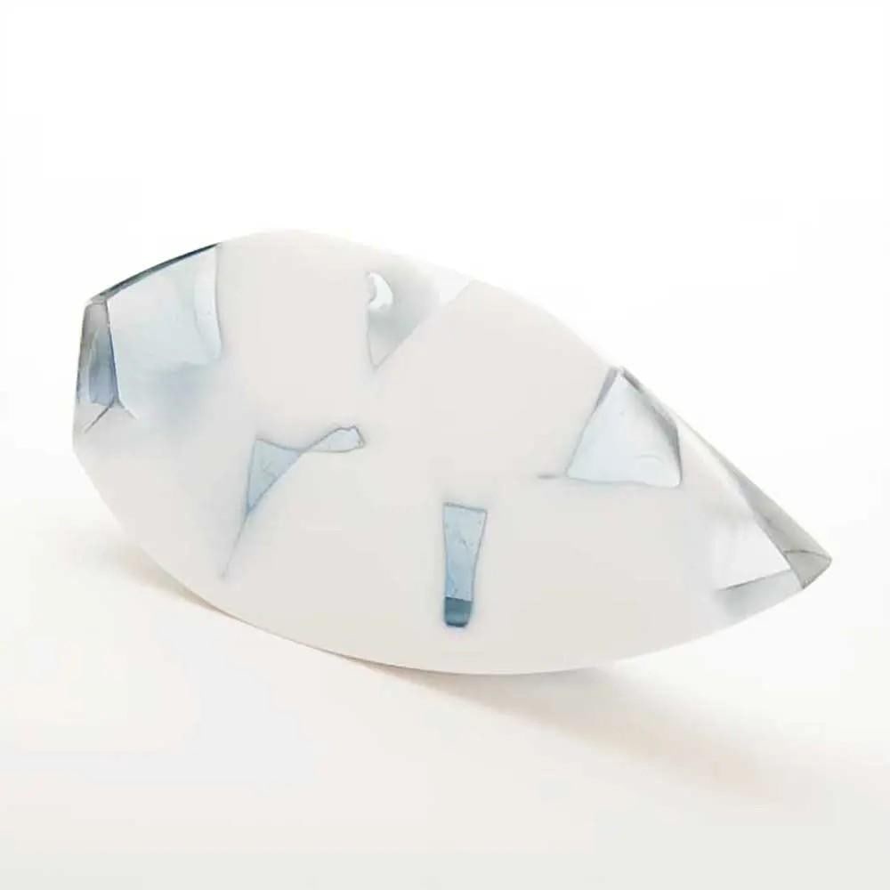 Wedge White Sculptural Glass Art by Jessamy Kelly: Wedge White Sculptural Glass Art by Jessamy Kelly "Wedge White" is a striking example of kiln-formed sculptural glass art by Jessamy Kelly. Crafted from a blend of white, steel blue, and