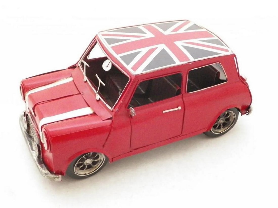 Die Cast 1960 Red Mini Cooper: Die Cast 1960 Red Mini Cooper Add sporty style to any space with our Rustic 1960 Mini Copper Car. Featuring a rustic iron frame and fine detailing, this vintage car includes a black metal seat finis