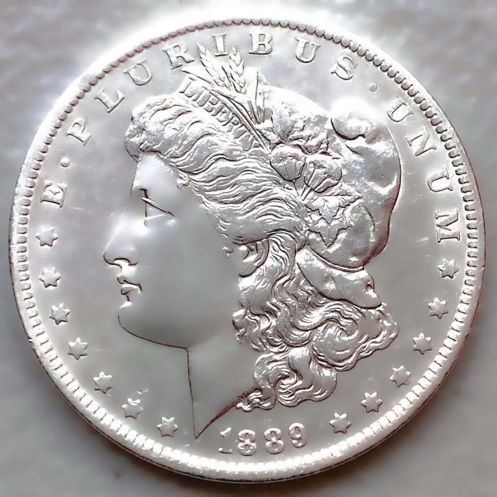 1889-O GOOD DATE AU/UNC MORGAN SILVER DOLLAR: 1889-O GOOD DATE AU/UNC MORGAN SILVER DOLLAR Certification: Uncertified Circulated/Uncirculated: Uncirculated Year: 1889 Composition: 900 Silver Mint Location: New Orle