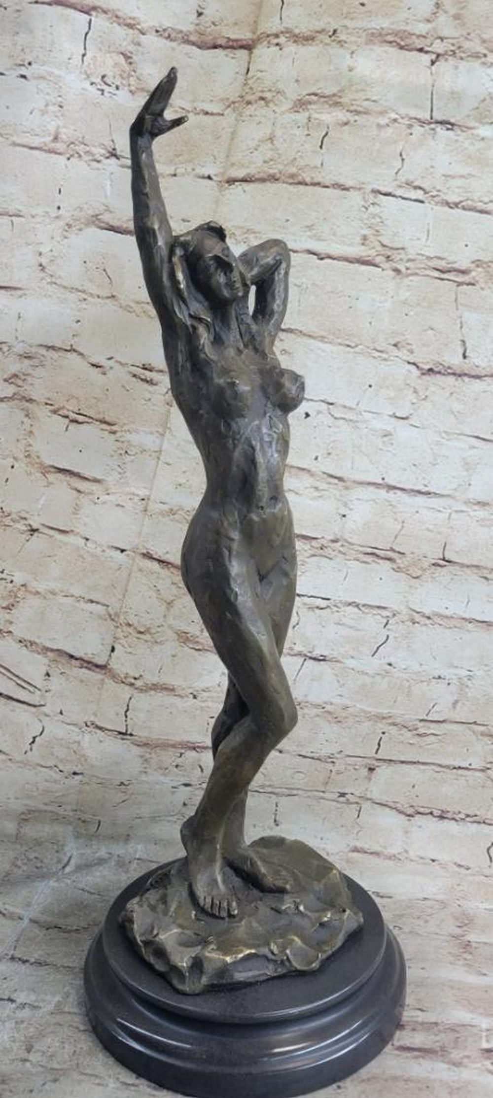 Nude Female Abstract Original Bronze Statue - 21" x 7": Nude Female Abstract Original Bronze Statue - 21" x 7" This bronze sculpture embodies confidence and sensuality, evoking the iconic pin-up models of the 1940s and 1950s. With her voluptuous f