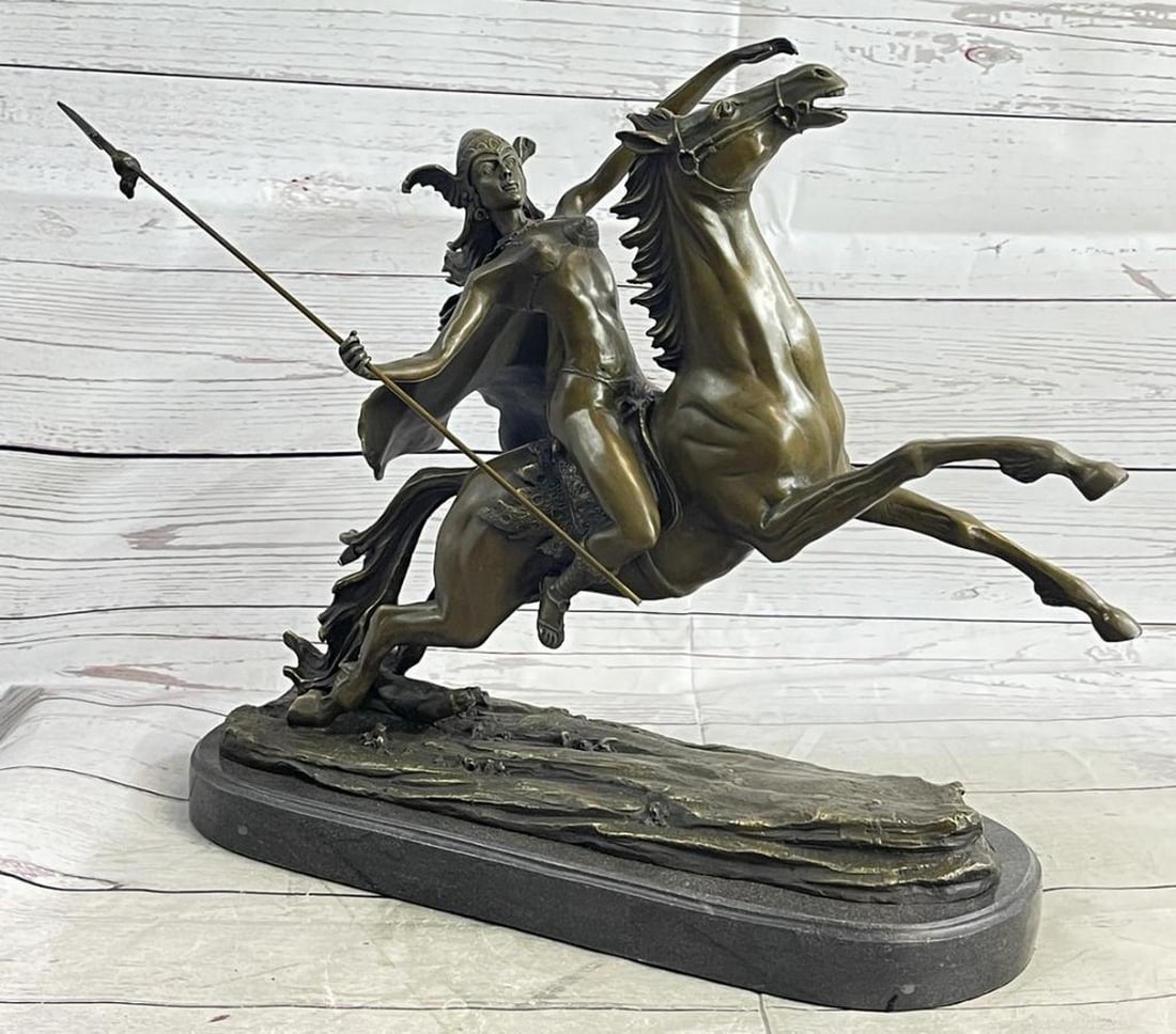 Nude Female Warrior on Horseback Inspired Bronze Statue - 13" x 16": Nude Female Warrior on Horseback Inspired Bronze Statue - 13" x 16" This captivating bronze sculpture embodies the essence of freedom, depicting a nude woman riding boldly through the forest,