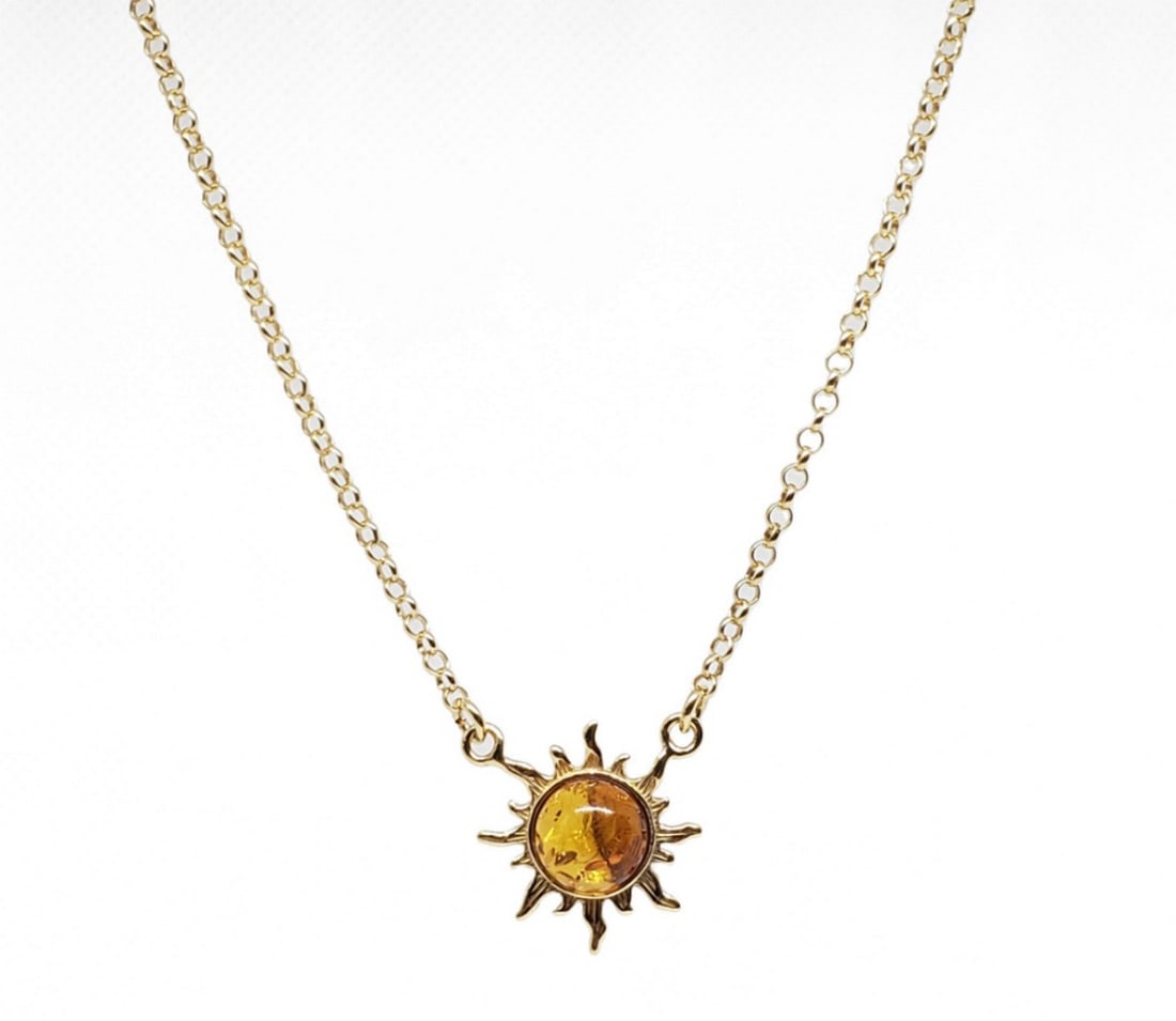 Sterling Silver Gold Plated Radiant Golden Sun Necklace: Sterling Silver Gold Plated Radiant Golden Sun Necklace The focal point of the necklace is the sunburst pendant, meticulously crafted from sterling silver and plated with radiant gold for an added to
