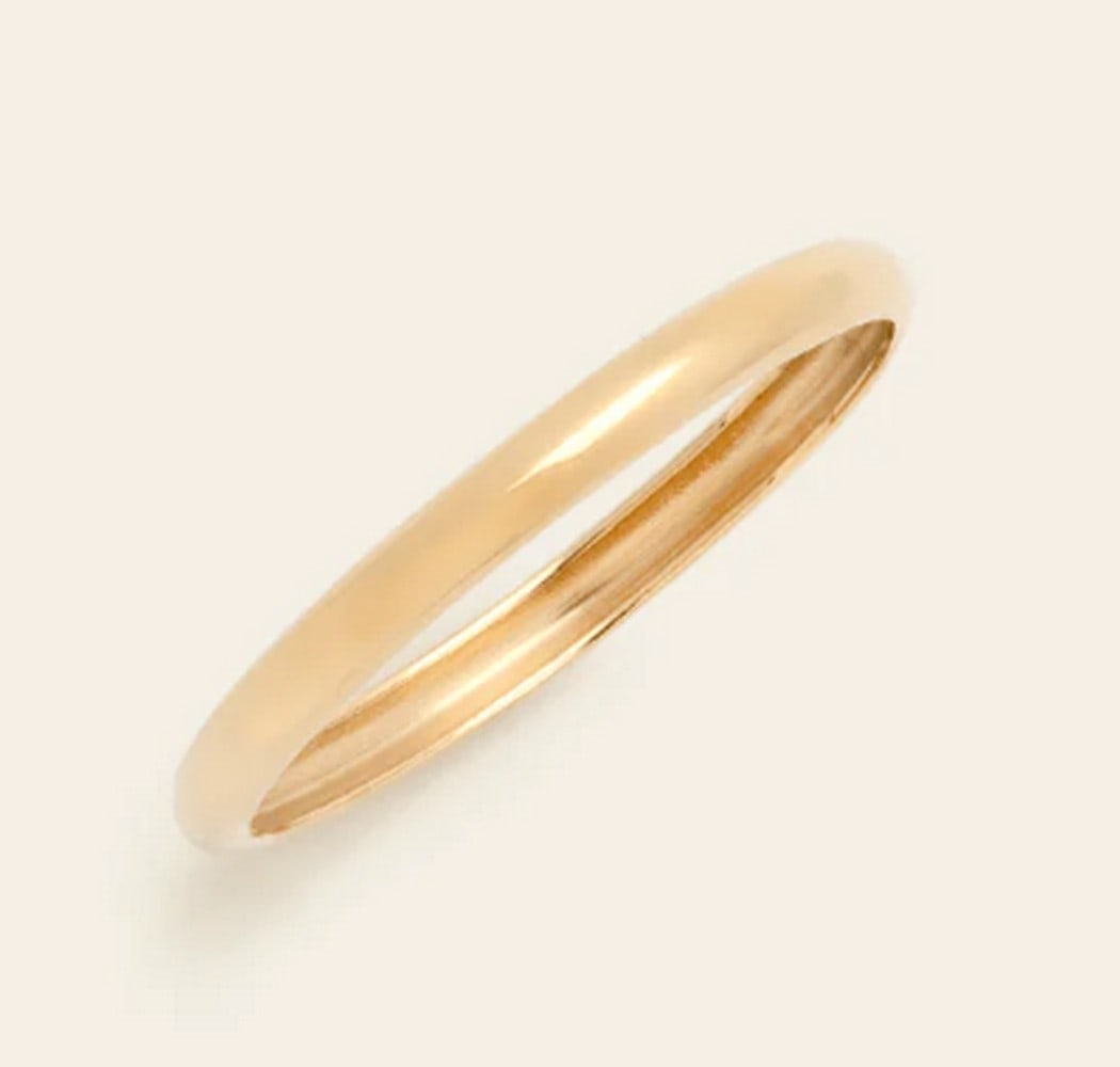 14K Solid Gold Women's Band: 14K Solid Gold Women's Band This 14K solid gold women's band exudes timeless elegance and simplicity. Crafted from pure gold, its sleek design and smooth finish make it a versatile choice for