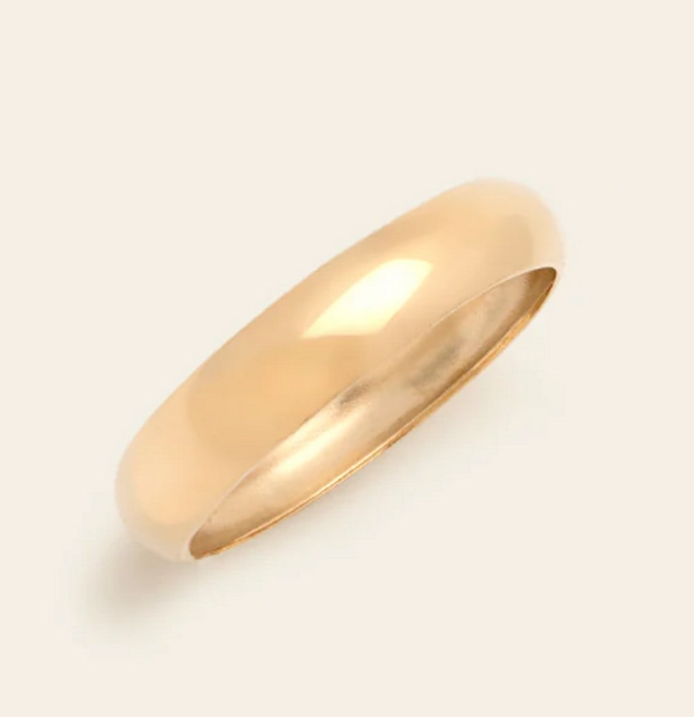 14k Solid Gold Women's Band: 14k Solid Gold Women's Band This 14K solid gold women's band is the epitome of timeless elegance. Crafted from pure gold, its sleek, polished design offers a versatile accessory for any