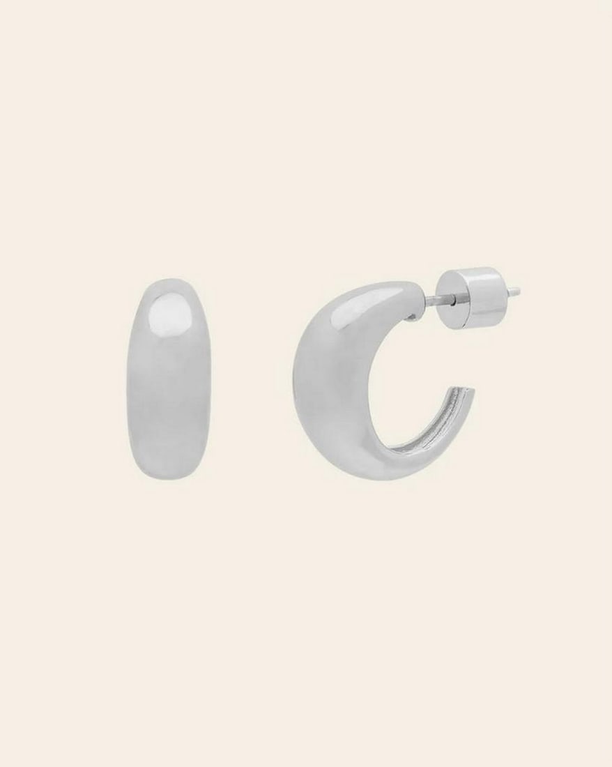 Sterling Silver Women's Curved Hoop Earrings: Sterling Silver Women's Curved Hoop Earrings These sterling silver curved hoop earrings offer a modern twist on a classic design. With their smooth, contoured shape, they provide a refined and