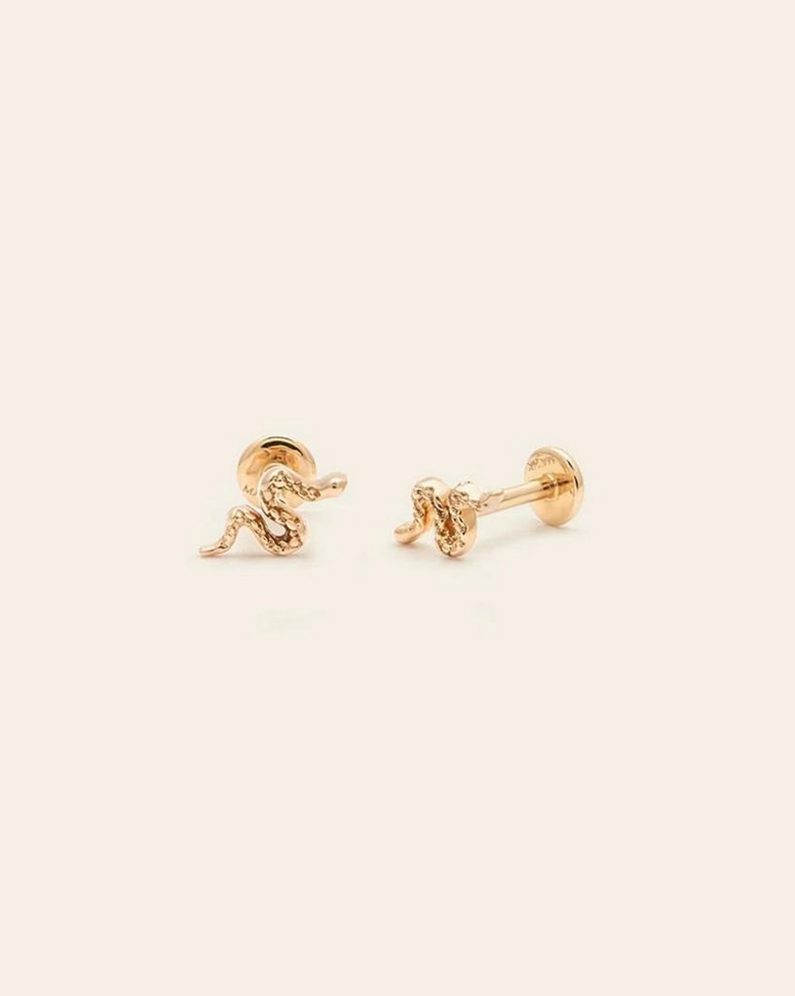 14k Solid Gold Women's Serpent Earrings: 14k Solid Gold Women's Serpent Earrings These 14K solid gold serpent earrings embody bold elegance with their sleek, sinuous design. Crafted to resemble the graceful curves of a serpent, they