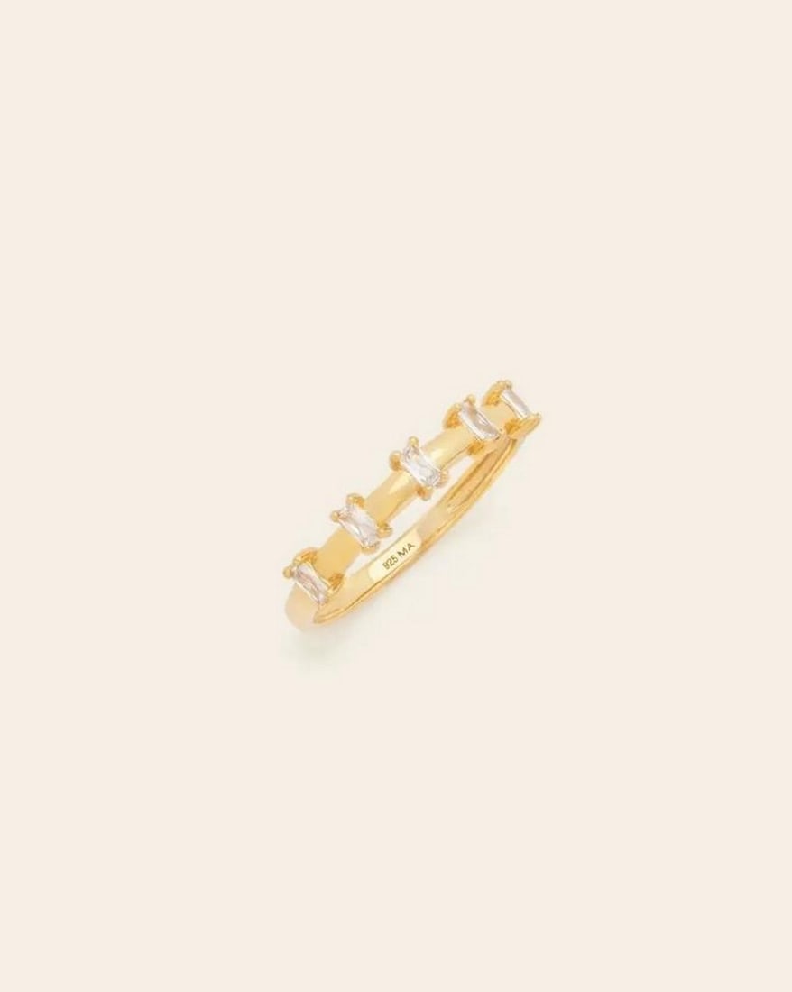 14k Vermeil Gold Plated Baguette Station Ring: 14k Vermeil Gold Plated Baguette Station Ring This 14k Vermeil Gold Plated Baguette Station Ring exudes modern elegance with a touch of sophistication. Featuring sleek baguette-cut stones