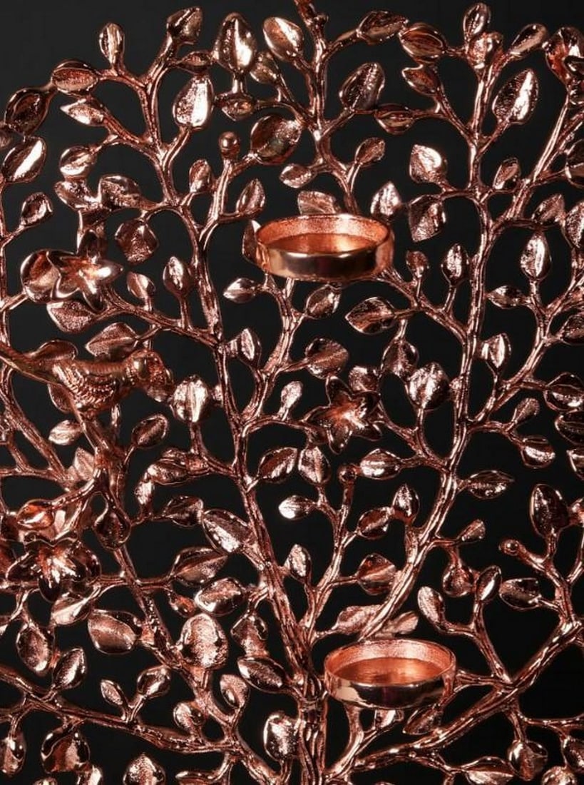 24" Rose Gold Plated Tree of Life Candle Holder: 24" Rose Gold Plated Tree of Life Candle Holder This Tree of Life candleholder symbolizes growth, strength, and interconnectedness. Delicately sculpted branches cast warm, intricate shadows