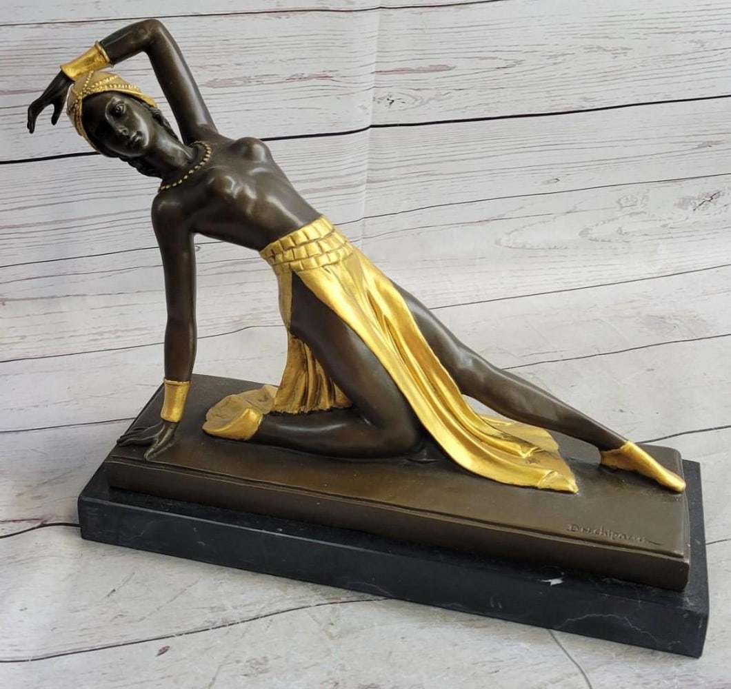 Topless Dancer In Shining Gold Skirt Bronze Sculpture: Topless Dancer In Shining Gold Skirt Bronze Sculpture This beautiful bronze sculpture is known as "The Exotic Dancer", one of the many of Chiparus` famous artworks. Here you s
