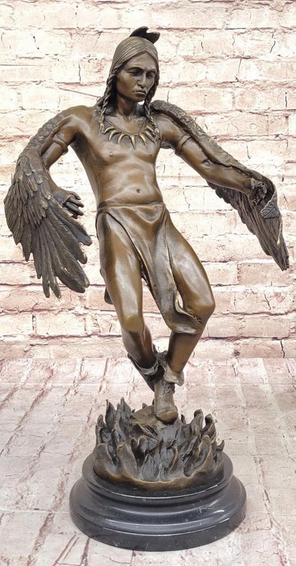 Dancing Shaman Bronze Sculpture - 18" x 10": Dancing Shaman Bronze Sculpture - 18" x 10" This sculpture of a Native American man who believes in the power of bird wings takes pride in his creation. He is standing with nothing but a clot