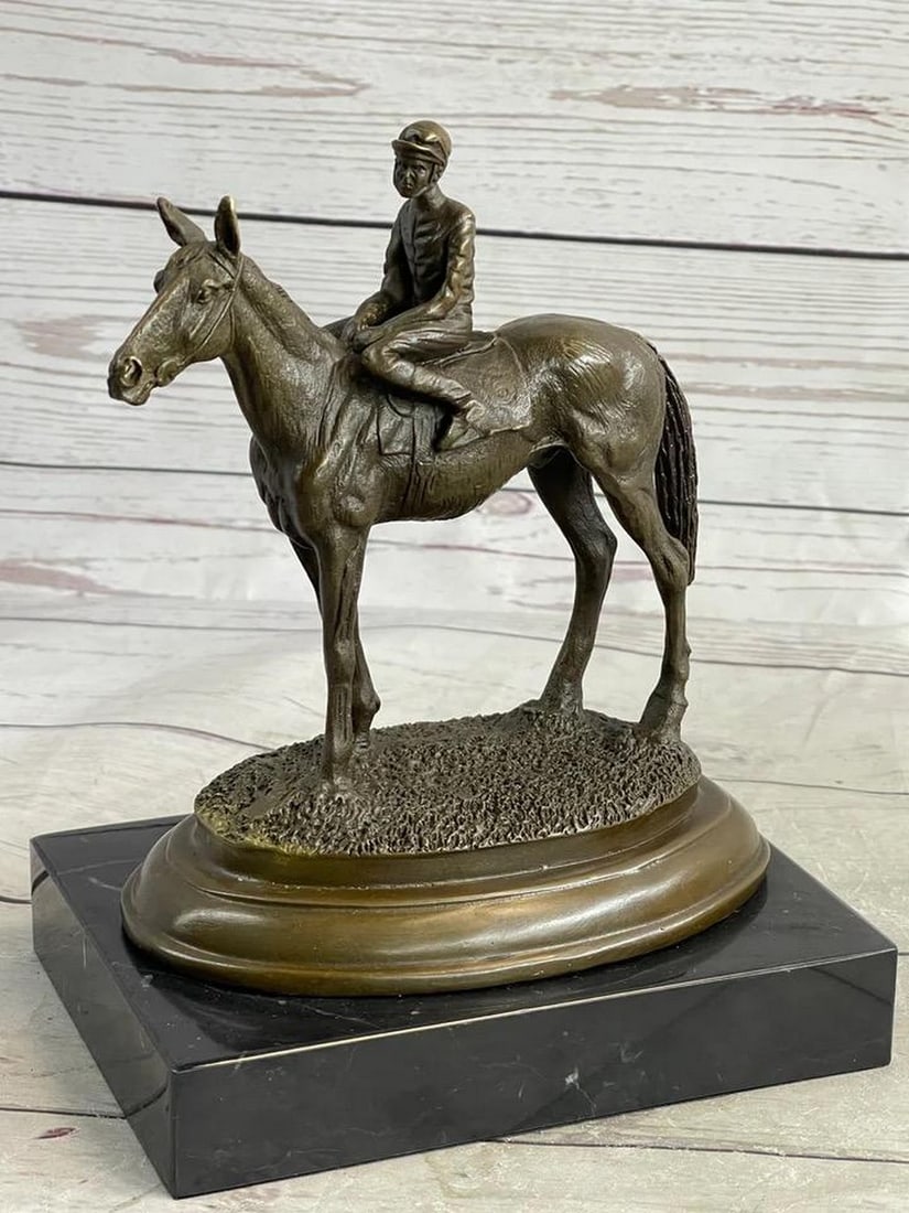 Racing Jockey Original Bronze Statue - 8" x 6.5": Racing Jockey Original Bronze Statue - 8" x 6.5" Experience the thrilling essence of a lifetime race with this captivating bronze sculpture. The dynamic synergy between the thoroughbred hors