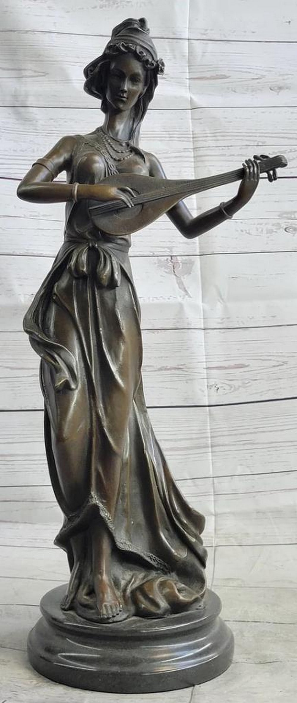 Female Playing Banjo Original Bronze Sculpture Signed by Jean Patoue on Marble Base - 20" x 8": Female Playing Banjo Original Bronze Sculpture Signed by Jean Patoue on Marble Base - 20" x 8" Immerse yourself in the exquisite artistry of Jean Patoue with this captivating bronze sculpture