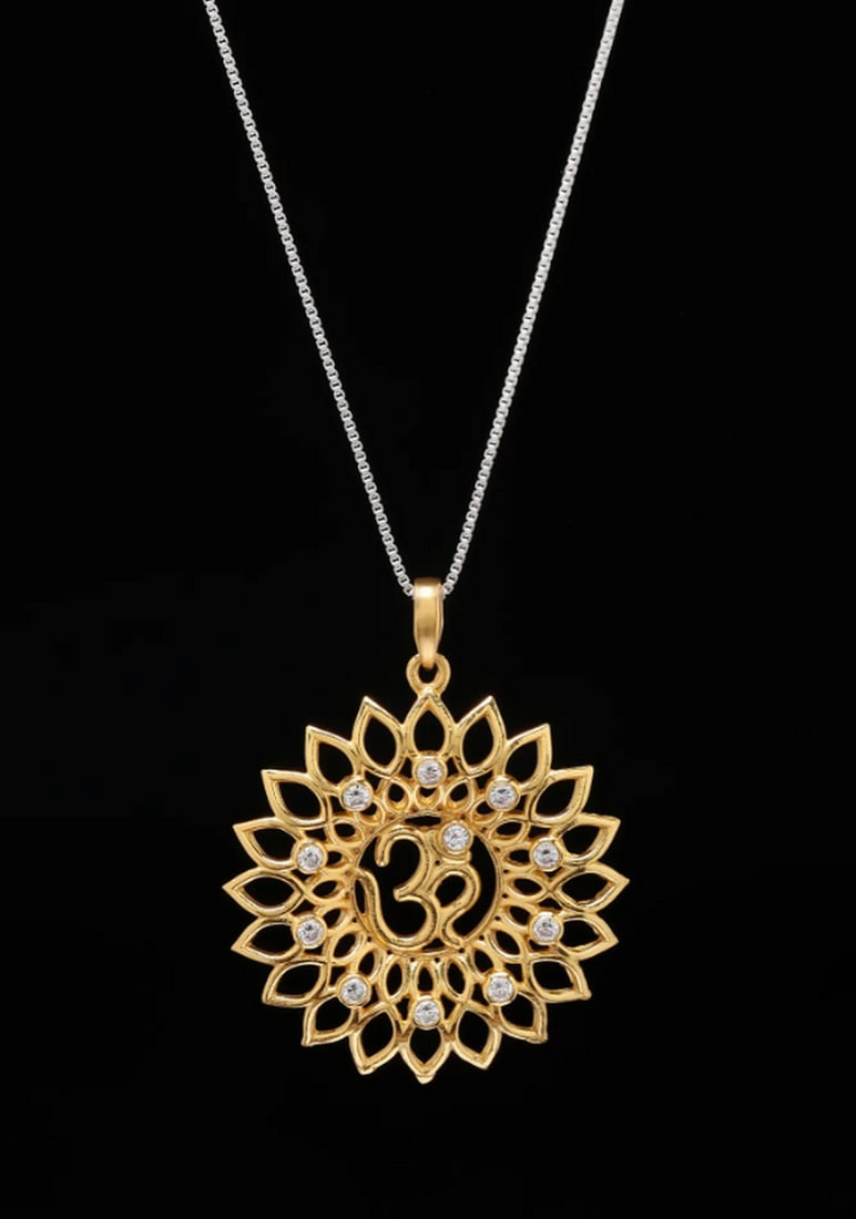 Sterling Silver Om Mandala Pendant with Cubic Zirconia: Sterling Silver Om Mandala Pendant with Cubic Zirconia This sterling silver pendant features the sacred Om symbol elegantly encased within a radiant mandala design, symbolizing the universe's