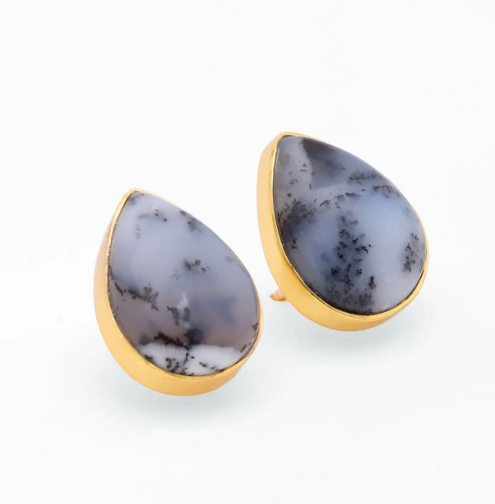 Mystic Dendrite Opal Drops: Mystic Dendrite Opal Drops These teardrop earrings highlight the unique beauty of dendrite opal, with delicate branching inclusions set in elegant gold-plated sterling silver. Their sophisticated