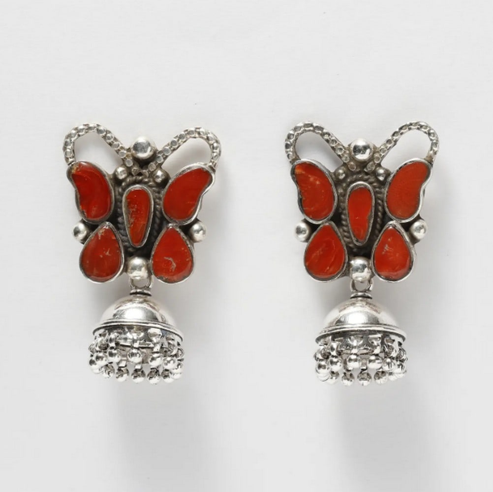 Mystic Coral Butterfly Jhumkis: Mystic Coral Butterfly Jhumkis These butterfly-shaped jhumki earrings blend traditional Indian craftsmanship with modern elegance. Featuring intricately crafted silver butterflies adorned with