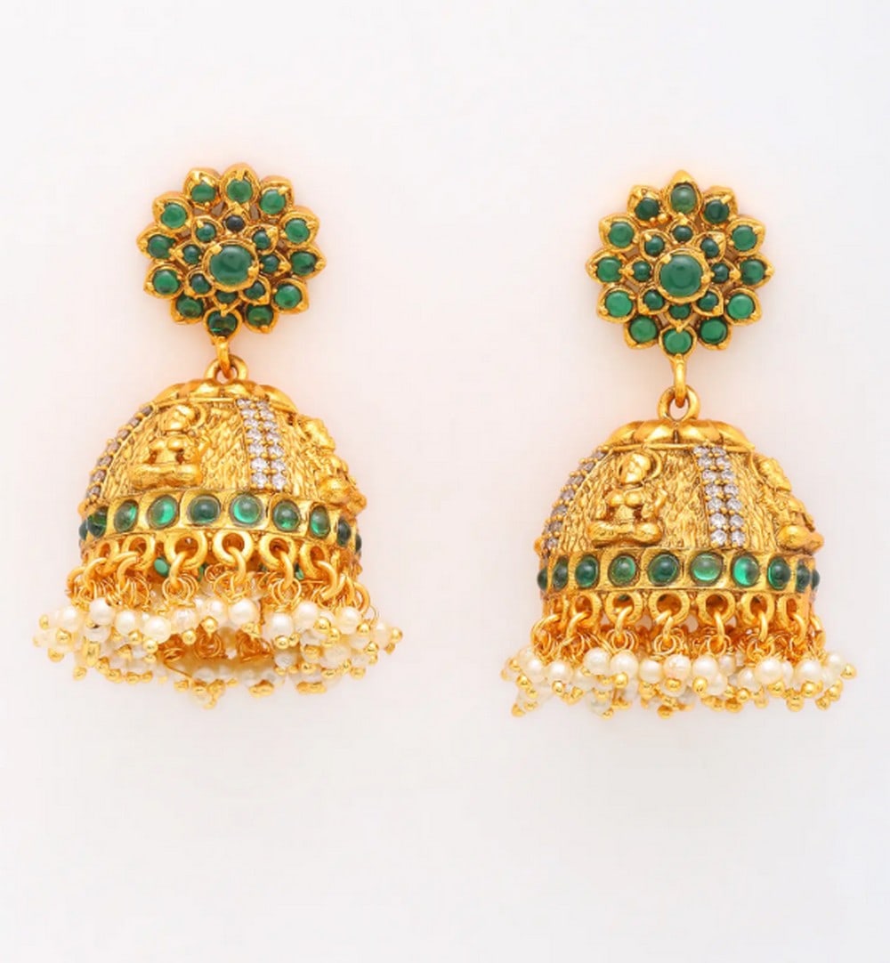 Verdant Glow Chrysoprase Hooks: Ethereal Lakshmi Studded Danglers These exquisite brass jhumkas, inspired by Goddess Lakshmi, showcase divine artistry. Their golden hue, vibrant green stones, and delicate pearls create a