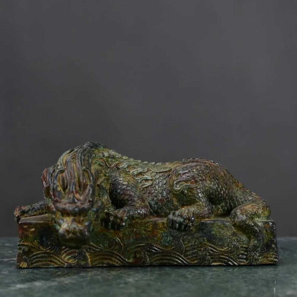 Antique Bronze Water Beast Statue: Antique Bronze Water Beast Statue This rare Chinese antique features a hand-crafted bronze statue of a water beast, symbolizing strength, protection, and the mysterious power of water. With