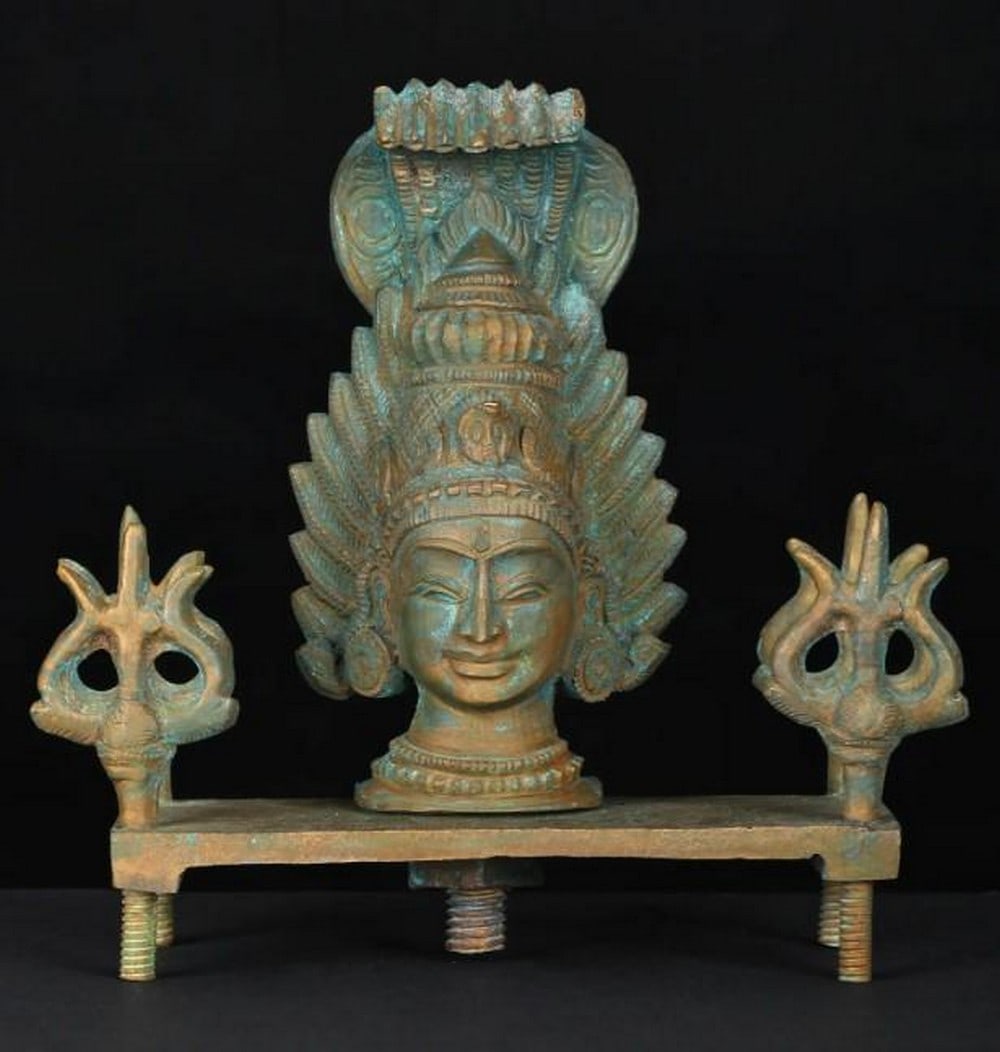 5" Majestic Goddess Mariamman Bronze Statue: 5" Majestic Goddess Mariamman Bronze Statue This majestic bronze statue of Goddess Mariamman radiates divine power and grace. Known as the goddess of rain and healing, she is depicted in a comman