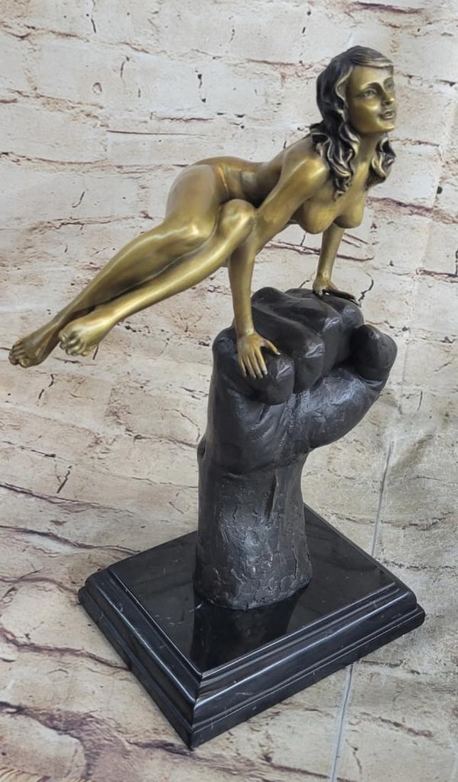 Original Surreal Nude Female Figure Balancing on a Fist Bronze Sculpture - 12.5" x 8": Original Surreal Nude Female Figure Balancing on a Fist Bronze Sculpture - 12.5" x 8" Created in solid bronze this wonderfully unique sculpture is beautifully abstract in design. Balancing wi