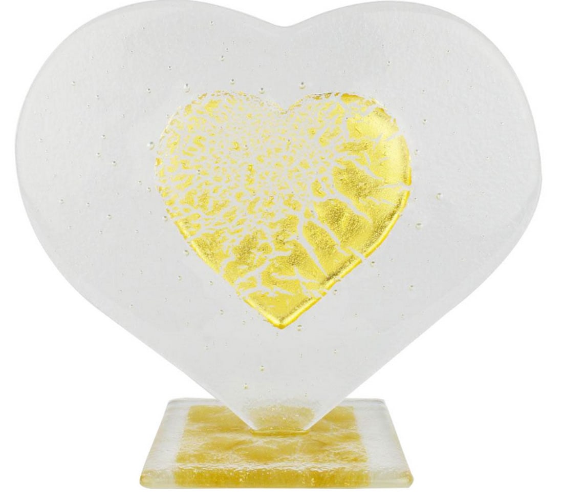 Clear Glass Heart with 24k Gold – Murano Art: Clear Glass Heart with 24k Gold – Murano Art This exclusive glass artwork features a heart crafted with the fused glass technique, showcasing a smaller heart adorned with real gold. The base is mad